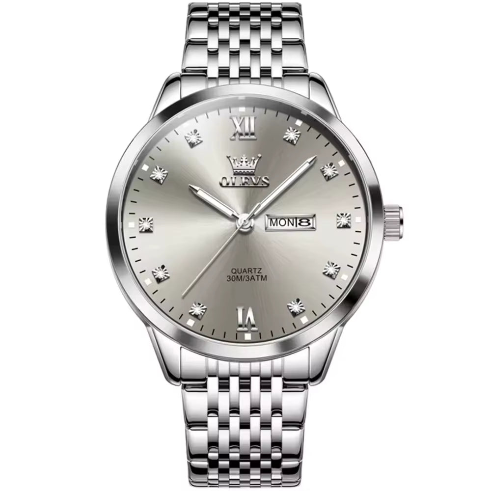OLEVS 2943 Fashion Quartz Watch – Stainless Steel Round Dial Wristwatch with Week & Calendar Display